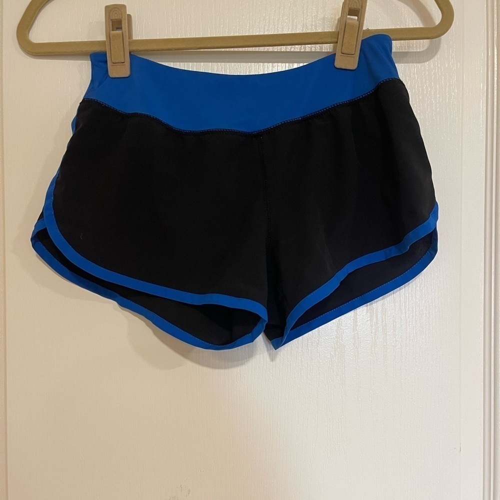 Authentic American Heritage blue and black shorts​​​​​​​​